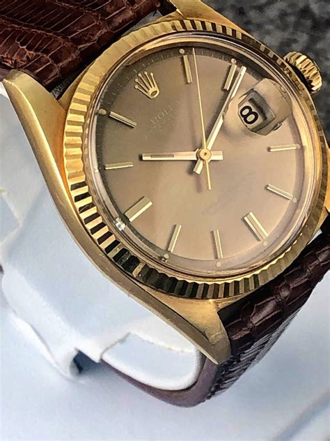 rolex 14 karat yellow gold datejust grey dial ref 1601|rolex 1601 gold bezel.